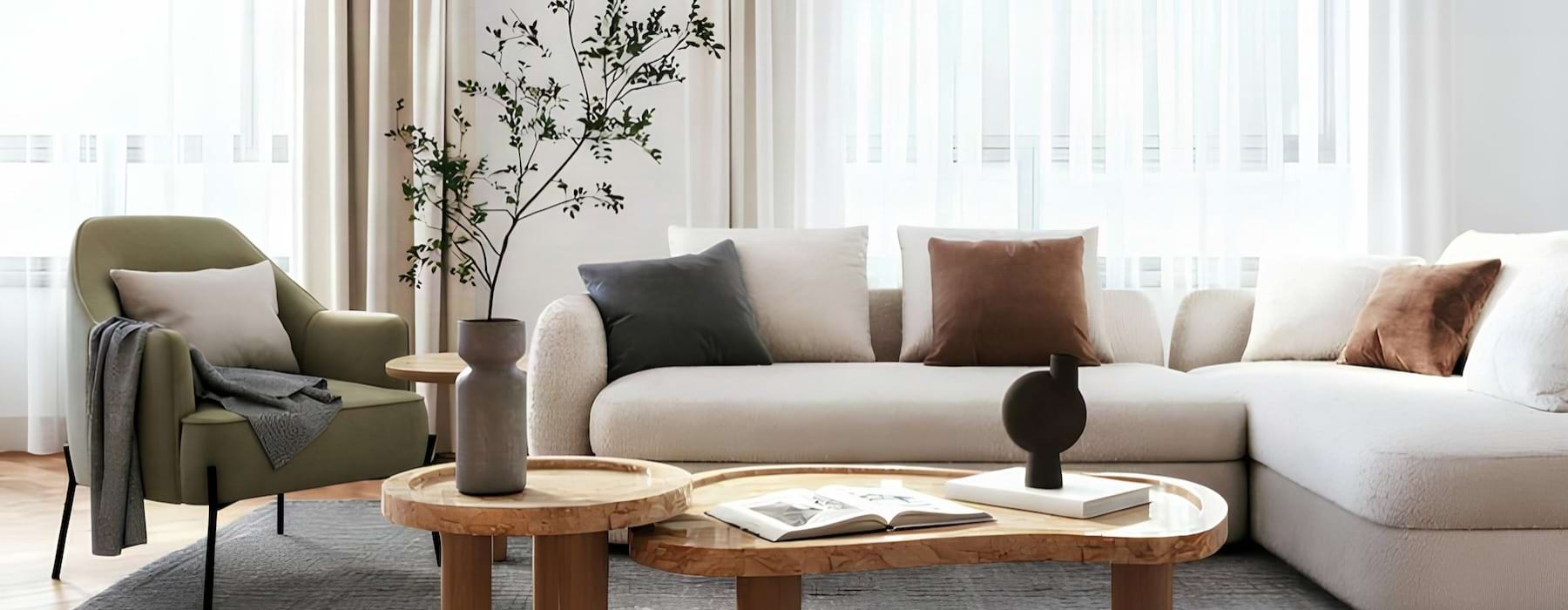 a living room with a white couch and a coffee table