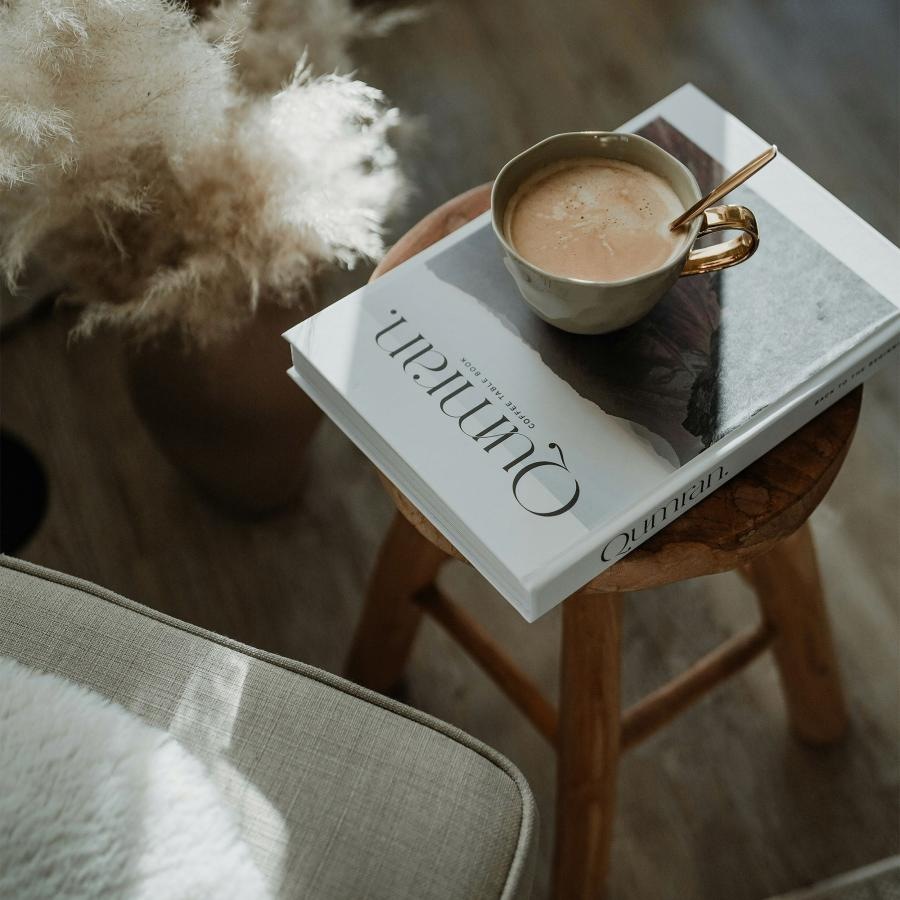 a cup of coffee on a book